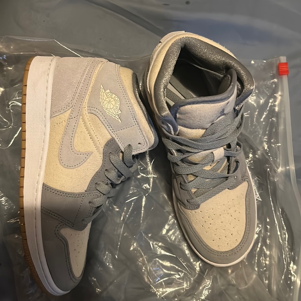 Grey and cream suede mid Jordan 1’s